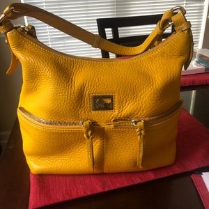 Dooney & Bourke Dillon II in yellow. Lightly used
